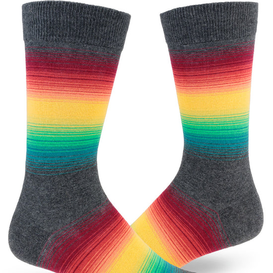 Men's crew socks with gradient of thin stripes in muted rainbow and gray colors.