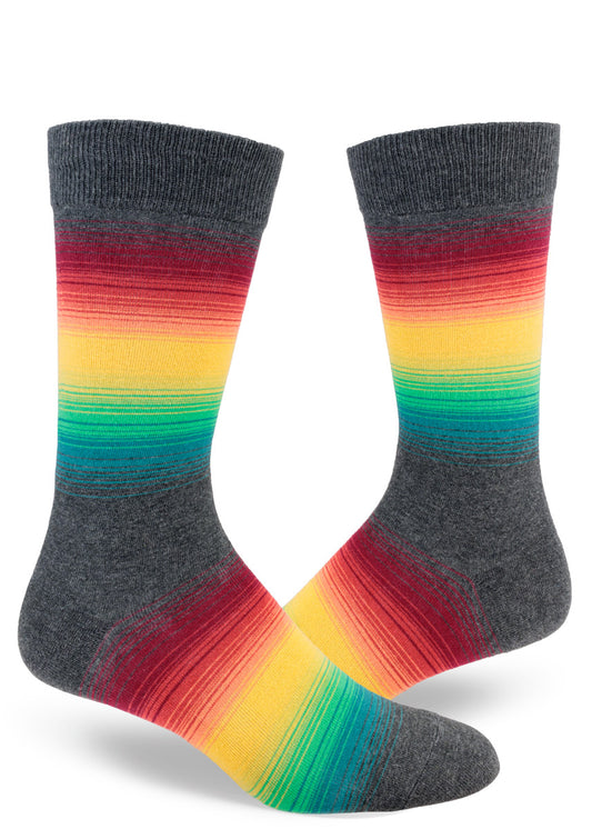 Men's crew socks with gradient of thin stripes in muted rainbow and gray colors.