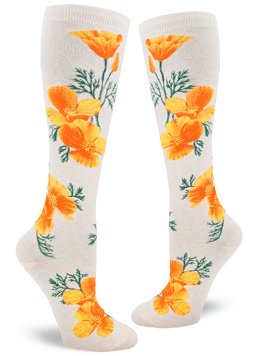 Cream knee socks with bright orange California poppy design of large flowers and green foliage.