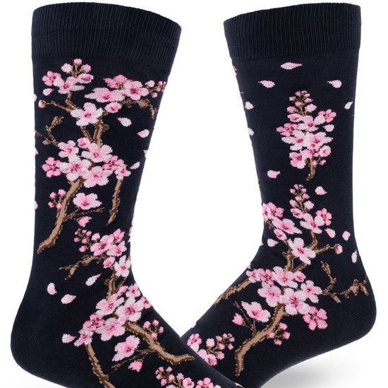 Dark navy crew socks for men with pink cherry blossoms on branches.