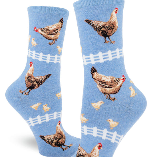 Blue crew socks for women with chicken pattern of hens, chicks and white picket fences.