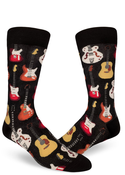 Black crew socks for men with multicolored electric and acoustic guitars in allover repeating patten.