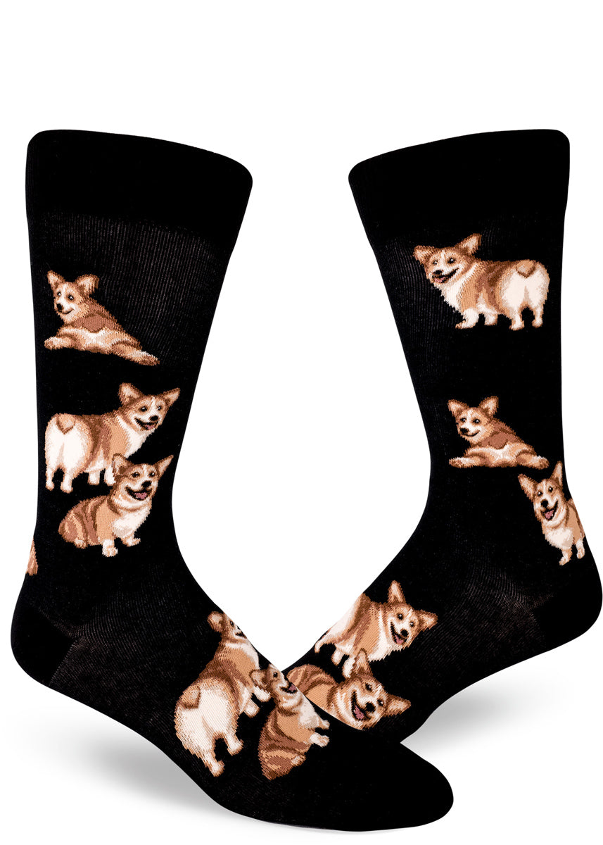 Black crew socks with men with corgi pattern of dogs sitting and showing their butts.