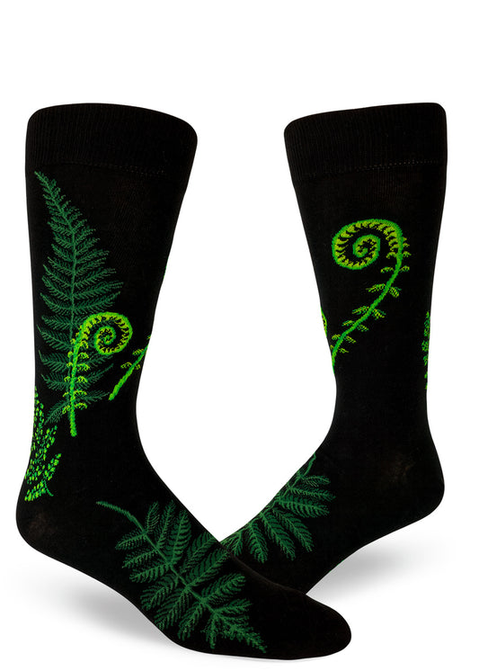 Black crew socks for men with green ferns and curly fiddleheads.