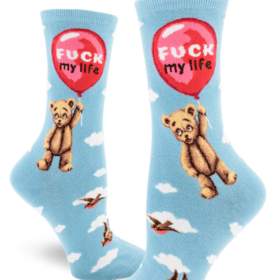 Light blue crew socks for women with teddy bears floating beneath red balloons with the words "Fuck My Life," birds and clouds.