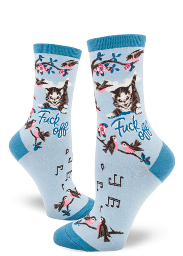 Light blue crew socks for women with the words "Fuck Off" and gray kittens, birds singing music notes and pink flowers.