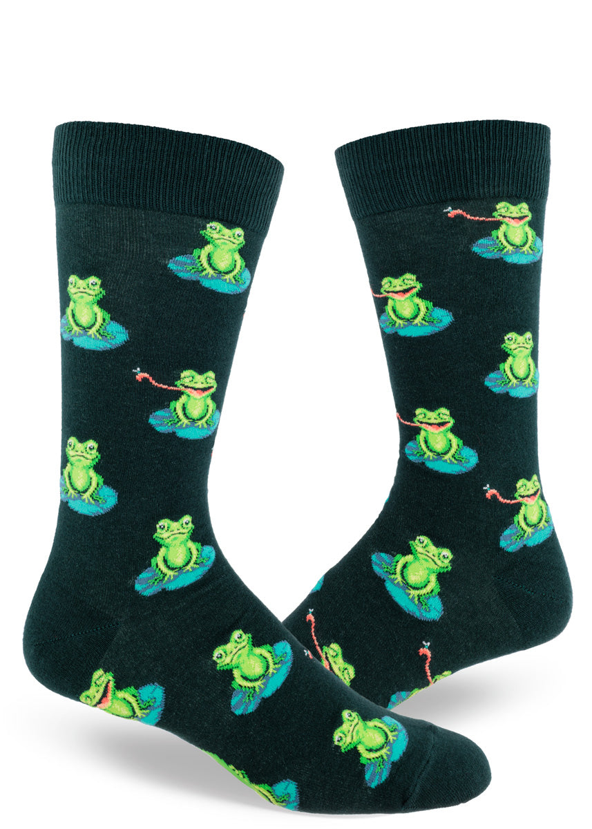 Dark green men's crew socks with allover repeating pattern of green frogs on lily pads, some with their tongues out to catch flies.