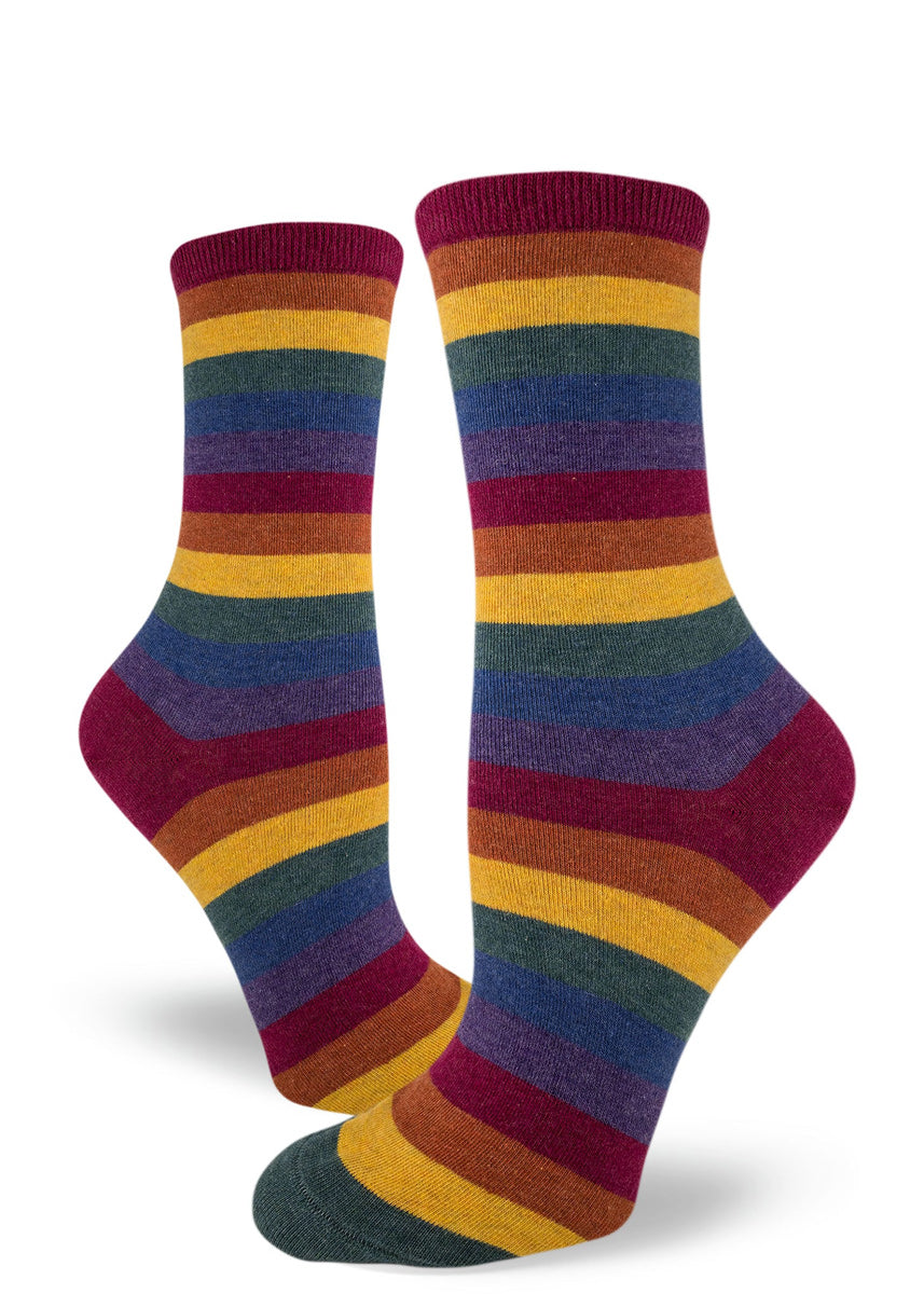 Striped crew socks for women with muted rainbow tones in dark heather colors.