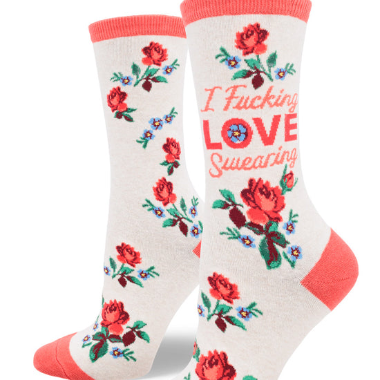 Cream crew socks for women with red accents and the words "I Fucking Loe Swearing" with red roses and blue forget-me-not flowers.