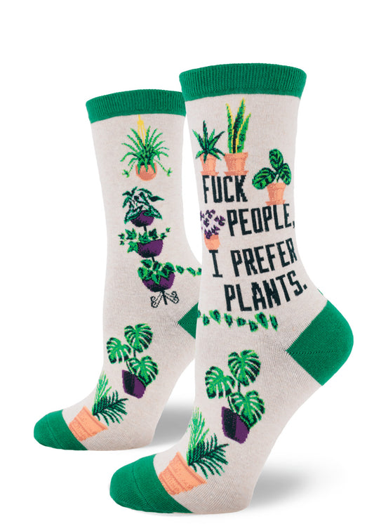 Cream colored crew socks for women with the words "Fuck People, I Prefer Plants,"  and houseplants.