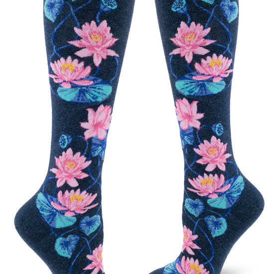 Navy blue knee socks with pink lotus flowers, blue lily pads and lotus seed pods.