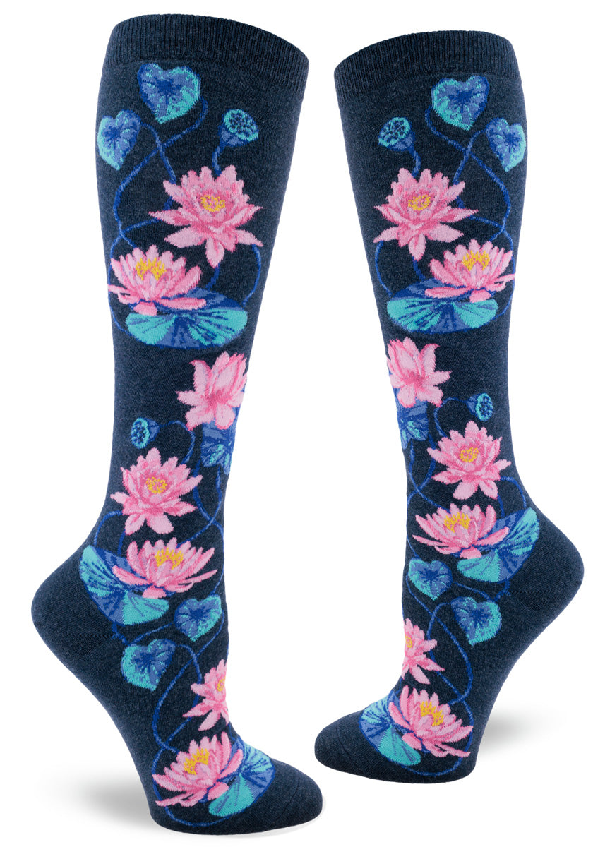 Navy blue knee socks with pink lotus flowers, blue lily pads and lotus seed pods.