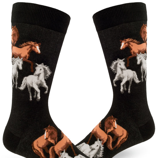 Men's black crew socks with a pattern of brown and white galloping horses.