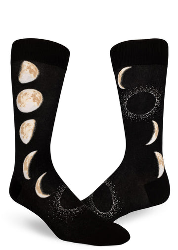 Black crew socks for men with realistic moons in different phases that progress up and down the sides.
