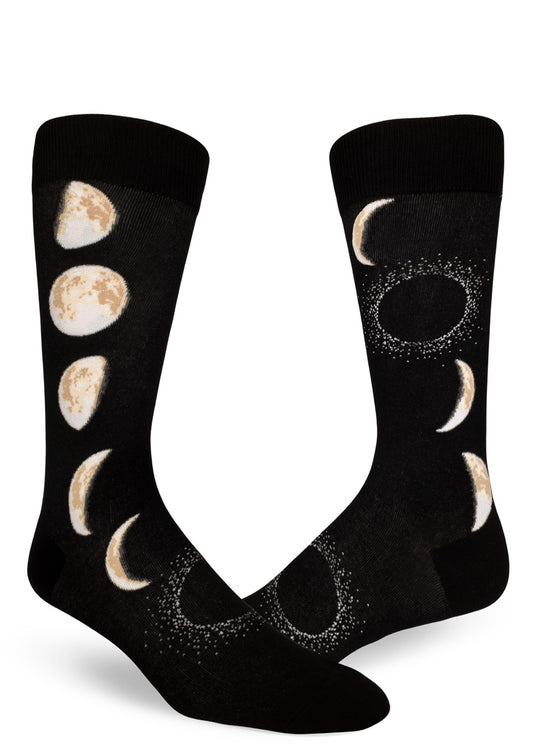 Black crew socks for men with realistic moons in different phases that progress up and down the sides.
