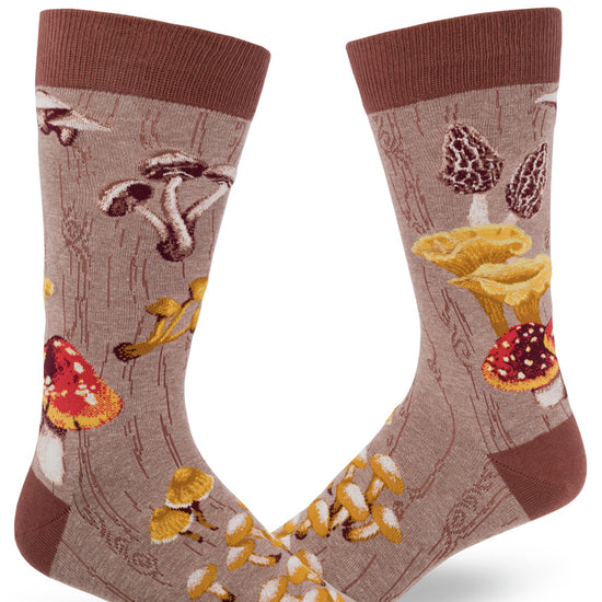 Brown crew socks for men with wild mushrooms and tree bark patterned design.