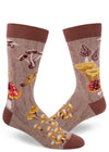 Brown crew socks for men with wild mushrooms and tree bark patterned design.