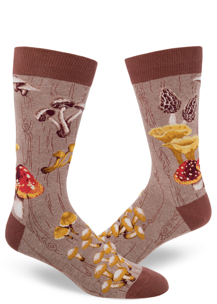 Brown crew socks for men with wild mushrooms and tree bark patterned design.