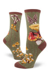 Green crew socks for women with bold wild mushrooms against a mossy tree bark base.