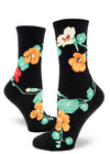 Black crew socks for women with nasturtium flowers in red, orange and yellow, and green foliage.
