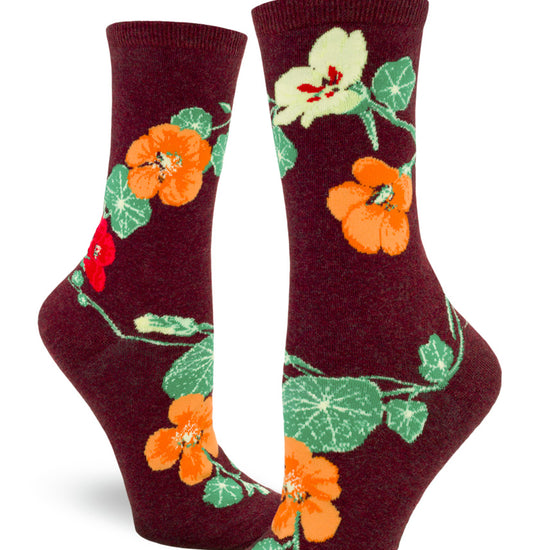 Maroon crew socks for women with floral design of nasturtiums in res, orange and yellow and green leaves.