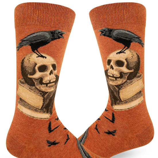 Rust orange men's crew socks with Poe-inspired design of ravens, skulls, books and inkwells.