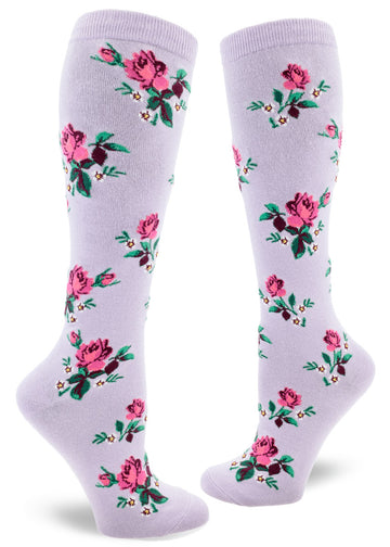Light purple knee-high socks with pink roses and small white flowers in an allover repeating pattern.