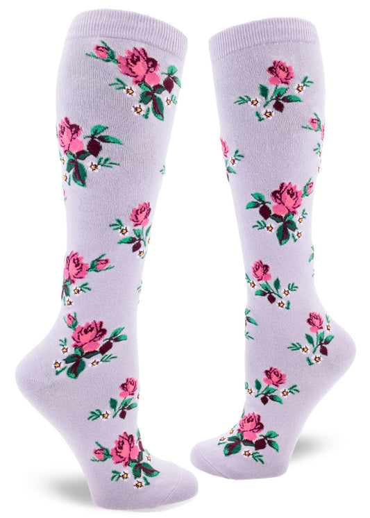 Light purple knee-high socks with pink roses and small white flowers in an allover repeating pattern.