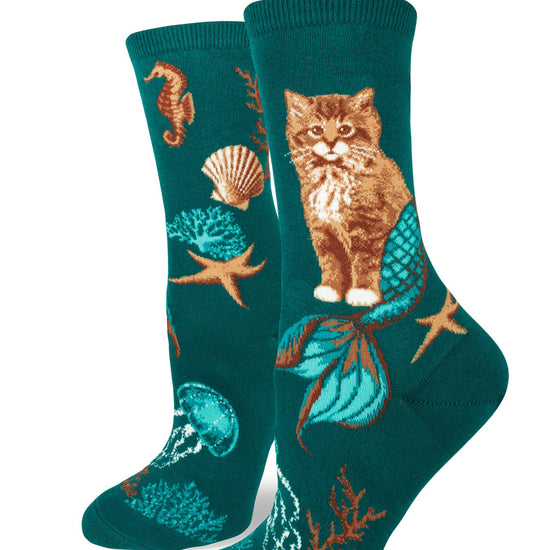 Teal crew socks for women with a cat mermaid design and sea creatures including jellyfish, seahorses and starfish.