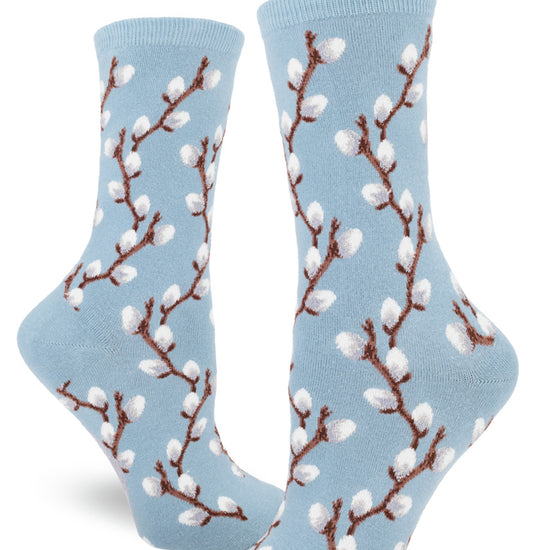 Light blue socks with textured gray pussy willows on brown branches.