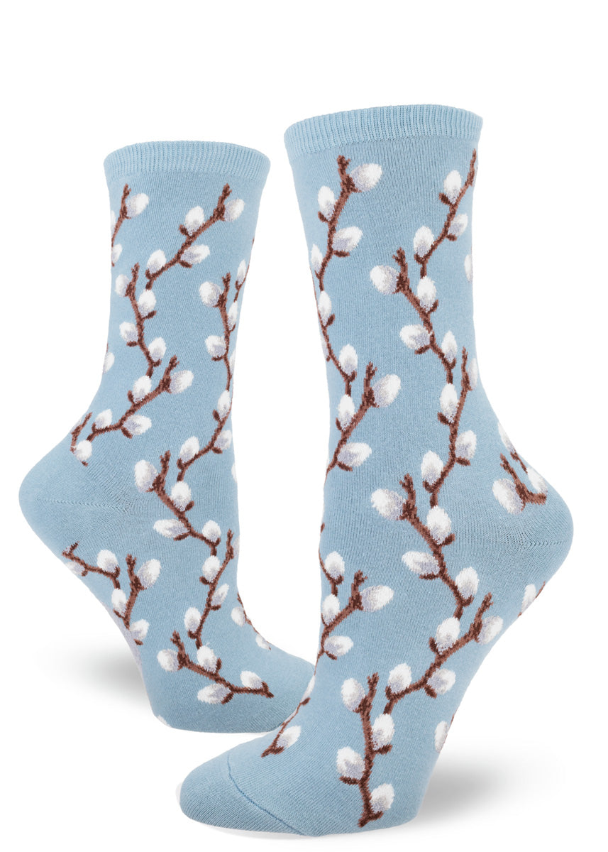 Light blue socks with textured gray pussy willows on brown branches.