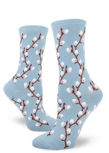 Light blue socks with textured gray pussy willows on brown branches.