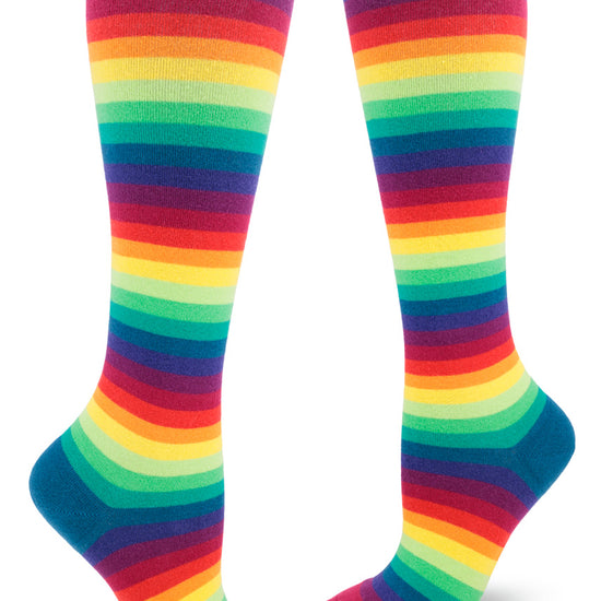 Rainbow striped knee high socks with bright narrow striped to create a bright gradient effect.