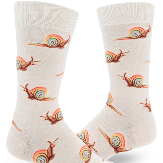 Cream colored crew socks for men with rainbow snails leaving trails of rainbow slime in repeating allover pattern.