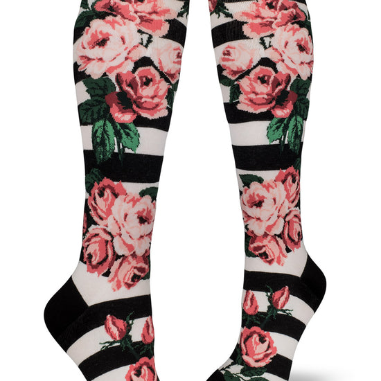 Black and white striped floral knee socks with large pink roses.
