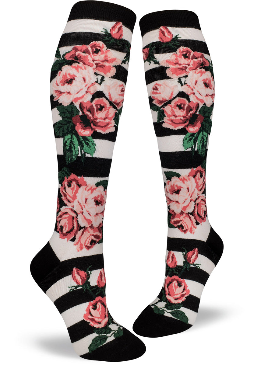 Black and white striped floral knee socks with large pink roses.