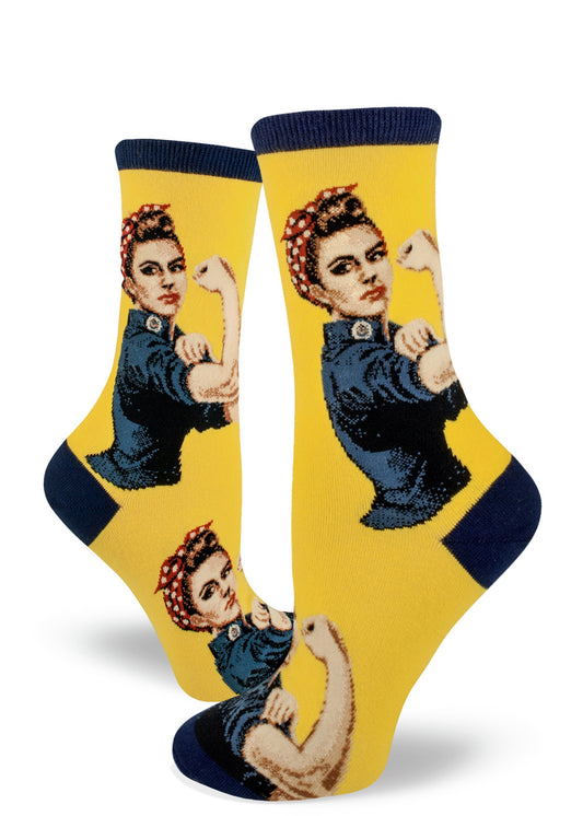 Yellow crew socks for women with Rosie the Riveter in a blue shirt with a red and white bandana, making a fist with a raised bicep.