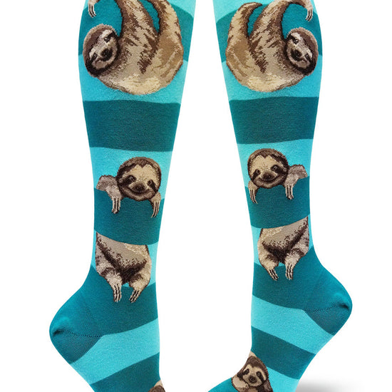 Teal striped knee-high socks with realistic sloths clinging to stripes as though they were branches of a tree.