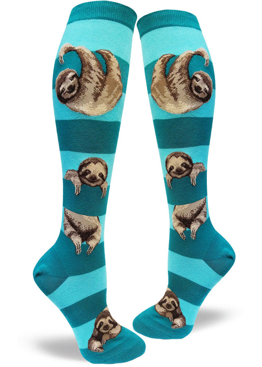 Teal striped knee-high socks with realistic sloths clinging to stripes as though they were branches of a tree.