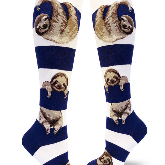Navy and white striped knee-high socks featuring cute realistic sloths hanging between stripes.