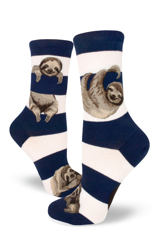Navy and white crew socks for women with cute realistic sloths relaxing and swinging from the blue stripes like they were branches.