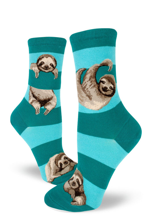 Teal women's crew socks with realistic sloths hanging from and resting on stripes as though they were tree branches.