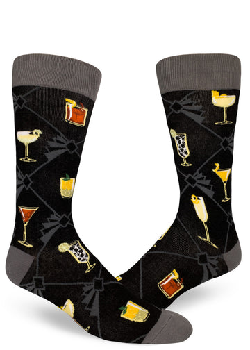 Black and gray crew socks for men with allover pattern of classic cocktails and art deco geometric lines.