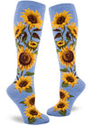 Light blue knee socks with large yellow and brown realistic sunflowers on the sides.