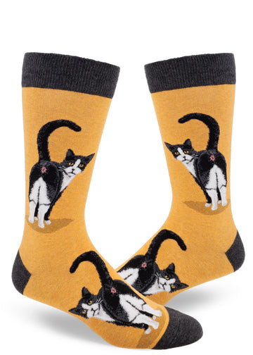 Yellow crew socks for men featuring a black and white cat showing its butt with its head turned back.
